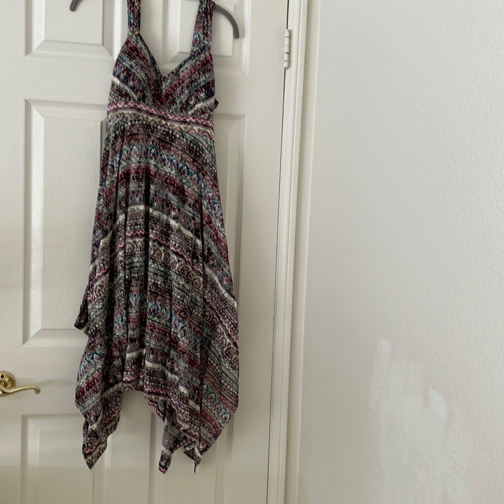 Shark bite hemline dress.